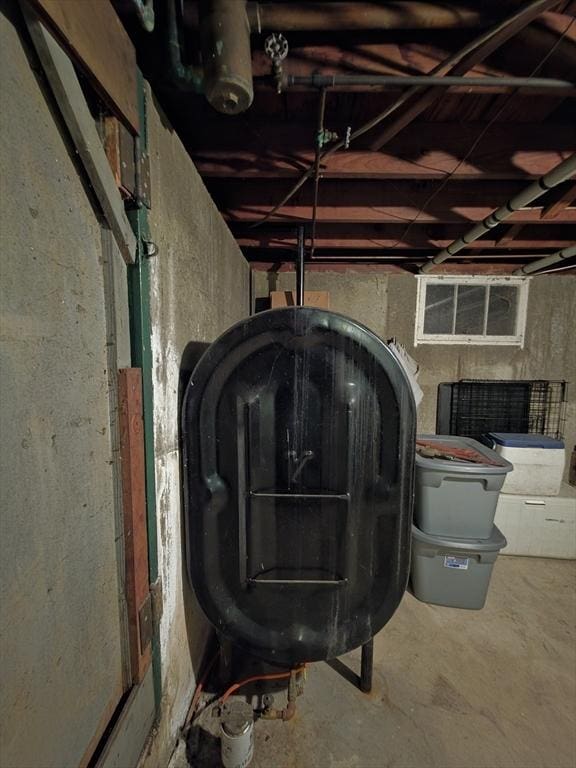 48 Sofia Rd, Stoughton, MA 02072 - basement view of heating fuel and unfinished concrete flooring