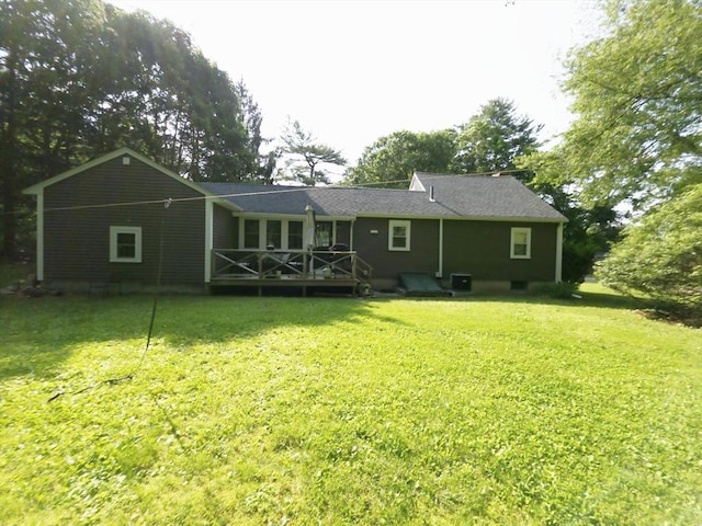 48 Sofia Rd, Stoughton, MA 02072 - back of property featuring a yard and a wooden deck