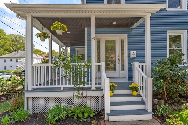 67 Prescott St, Medford, MA 02155 - view of exterior entry featuring a porch
