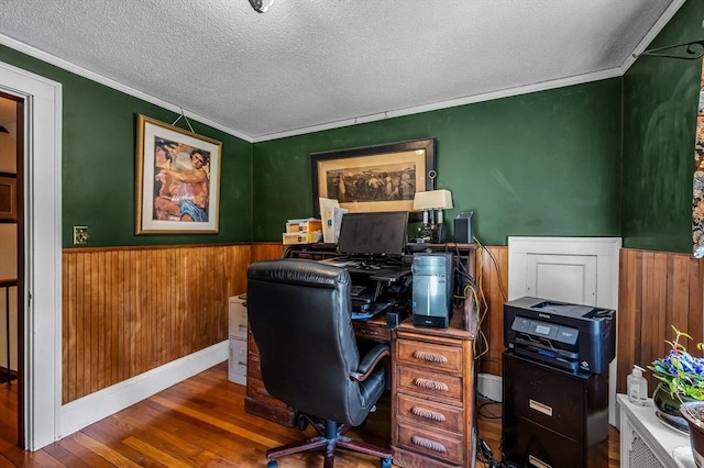 68 Ingersoll Grv, Springfield, MA 01109 - office space featuring a textured ceiling, wood walls, wood finished floors, a wainscoted wall, and ornamental molding