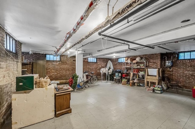 68 Ingersoll Grv, Springfield, MA 01109 - below grade area with plenty of natural light and brick wall