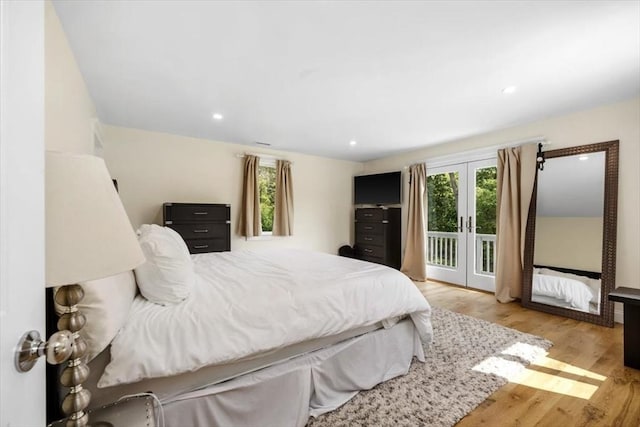 4 Cushing St, Hingham, MA 02043 - bedroom with access to outside, light wood-style floors, french doors, and recessed lighting