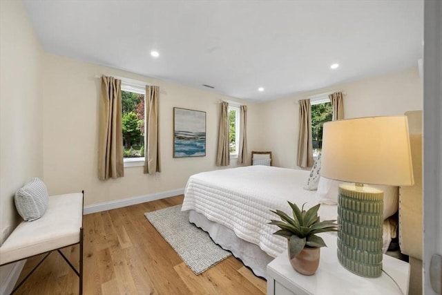 4 Cushing St, Hingham, MA 02043 - bedroom with wood finished floors, baseboards, and recessed lighting