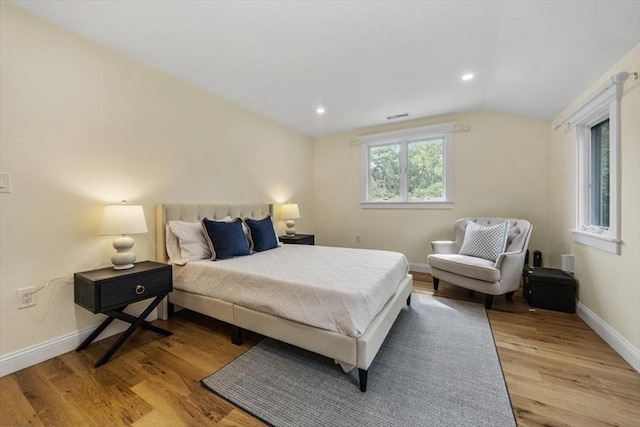 4 Cushing St, Hingham, MA 02043 - bedroom with lofted ceiling, wood finished floors, baseboards, and recessed lighting