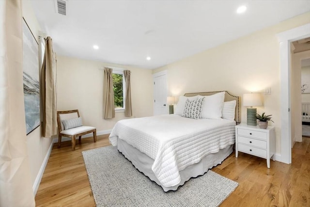 4 Cushing St, Hingham, MA 02043 - bedroom with baseboards, light wood finished floors, recessed lighting, and radiator