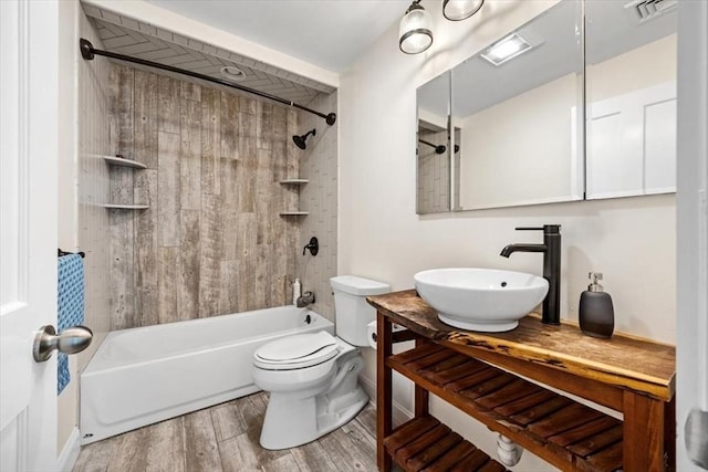 4 Cushing St, Hingham, MA 02043 - full bath with vanity, washtub / shower combination, wood finished floors, toilet, and baseboards