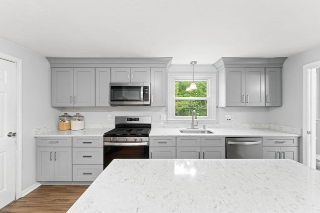 18 Buena Vis Unit 18, Franklin, MA 02038 - kitchen featuring stainless steel appliances, gray cabinets, a sink, and wood finished floors