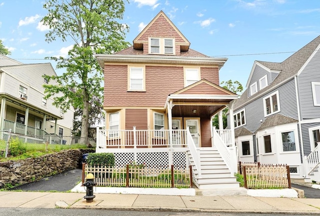 22-22A Montrose St, Boston, MA 02119 - american foursquare style home featuring a porch and stairs