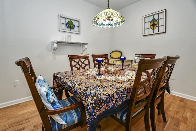 dining area featuring hardwood / wood-style flooring