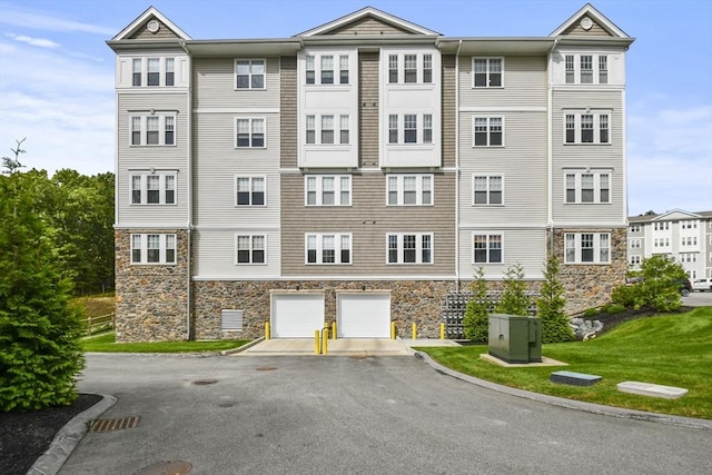 view of building exterior featuring a garage