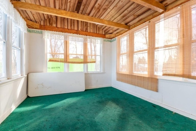 unfurnished sunroom with wooden ceiling and beam ceiling