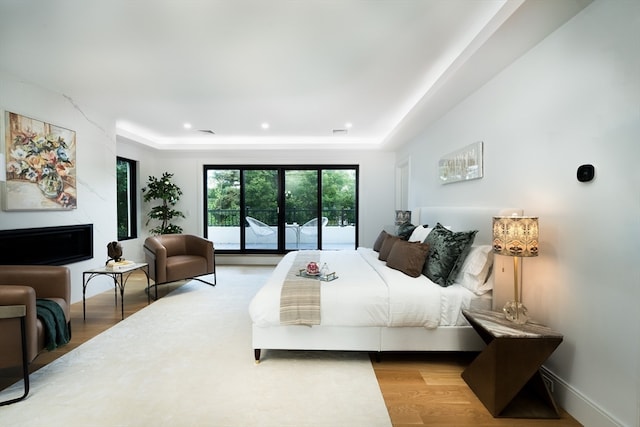 bedroom with light wood-type flooring