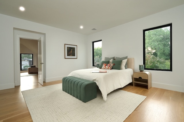 bedroom featuring light hardwood / wood-style floors