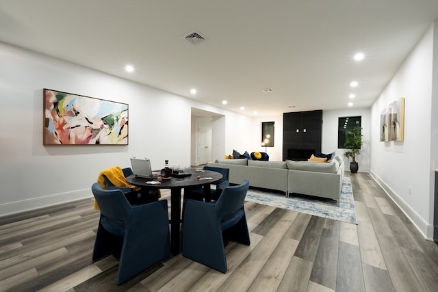 dining room featuring wood-type flooring