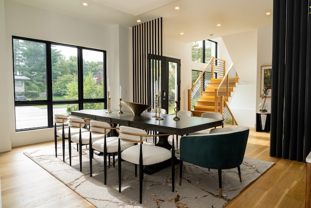 dining area with light hardwood / wood-style flooring