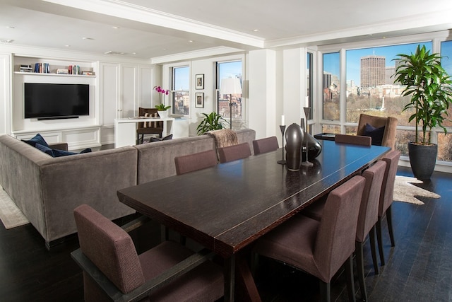 dining area featuring recessed lighting, crown molding, dark wood-type flooring, and a healthy amount of sunlight