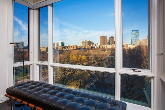 sunroom / solarium with a view of city
