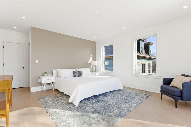 bedroom featuring light hardwood / wood-style floors