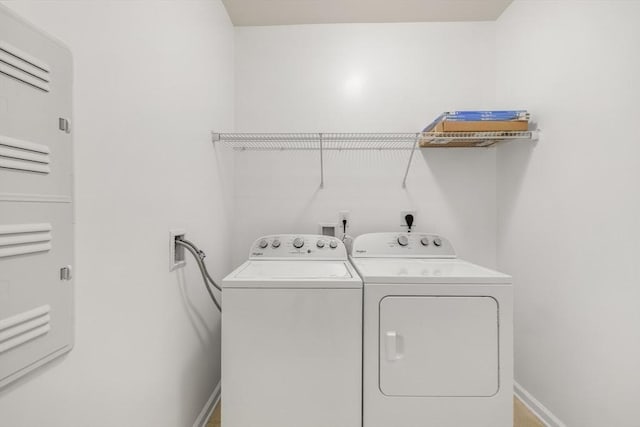 laundry area featuring washing machine and dryer