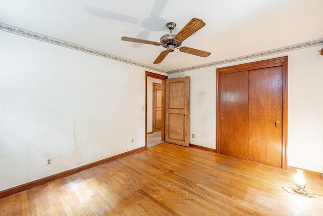 399 Elm St, East Longmeadow, MA 01028 - unfurnished bedroom featuring light wood finished floors, baseboards, a ceiling fan, and a closet