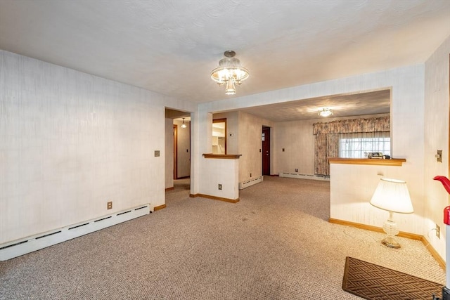 399 Elm St, East Longmeadow, MA 01028 - unfurnished living room featuring a baseboard heating unit, baseboards, and carpet floors
