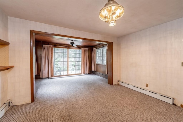 399 Elm St, East Longmeadow, MA 01028 - carpeted spare room featuring a baseboard radiator, a ceiling fan, and a chandelier