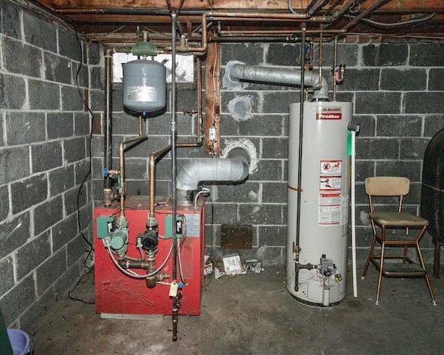 utility room with gas water heater and a heating unit