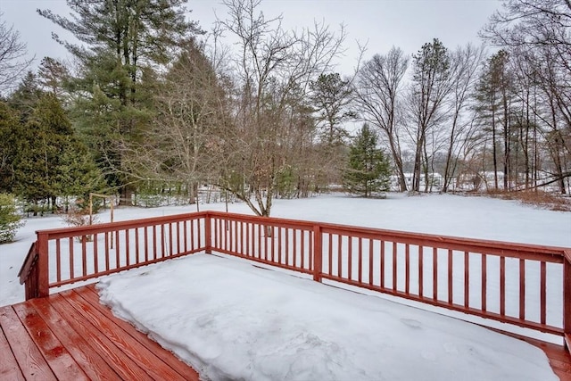 view of snow covered deck