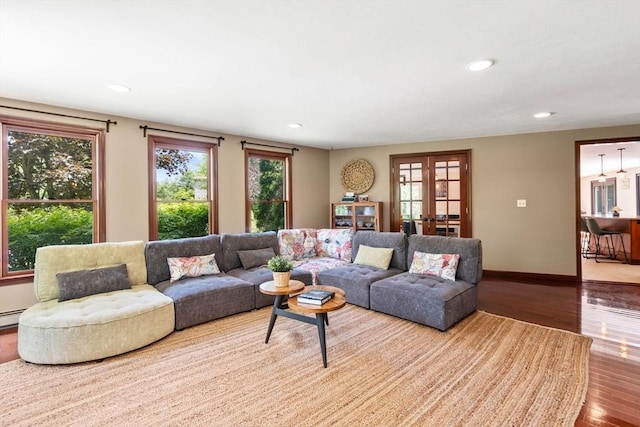 85 Green Meadow Ct, Northbridge, MA 01588 - living room featuring plenty of natural light, wood finished floors, recessed lighting, baseboards, and french doors