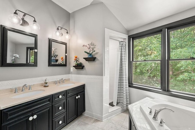 85 Green Meadow Ct, Northbridge, MA 01588 - full bath with a shower stall, double vanity, a bath, tile walls, and vaulted ceiling