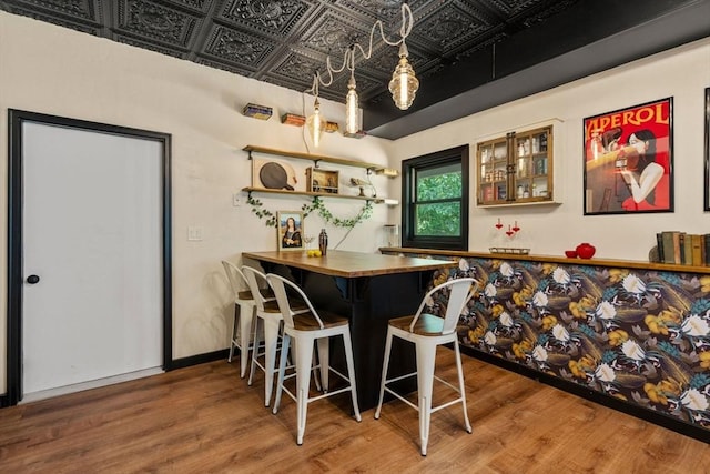 85 Green Meadow Ct, Northbridge, MA 01588 - bar area featuring an ornate ceiling and wood finished floors