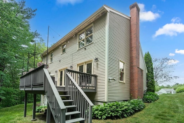 85 Green Meadow Ct, Northbridge, MA 01588 - back of house featuring stairway, a deck, a chimney, and a yard