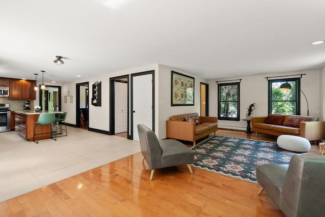 85 Green Meadow Ct, Northbridge, MA 01588 - living area featuring light wood-type flooring, recessed lighting, and baseboards