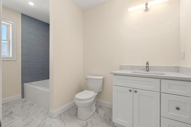 13 River St Unit 1, Danvers, MA 01923 - bathroom with baseboards, marble finish floor, and toilet