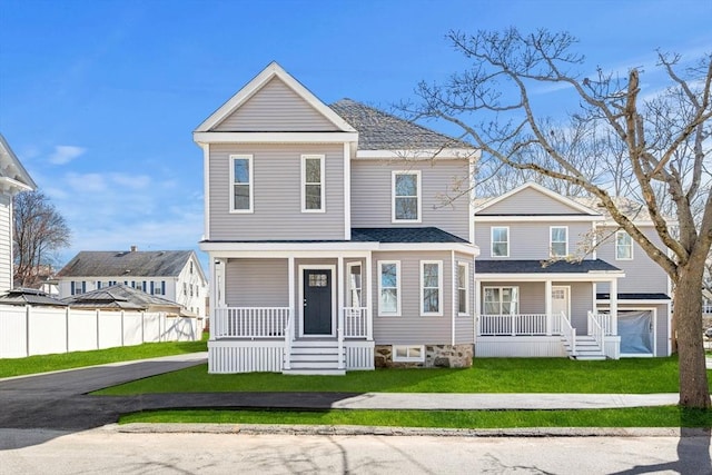 13 River St Unit 1, Danvers, MA 01923 - view of front facade with a shingled roof, a front yard, covered porch, and fence