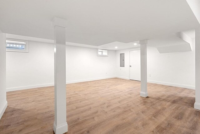 13 River St Unit 1, Danvers, MA 01923 - basement with light wood finished floors, electric panel, baseboards, and recessed lighting