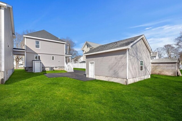 13 River St Unit 1, Danvers, MA 01923 - back of house with a yard and an outbuilding