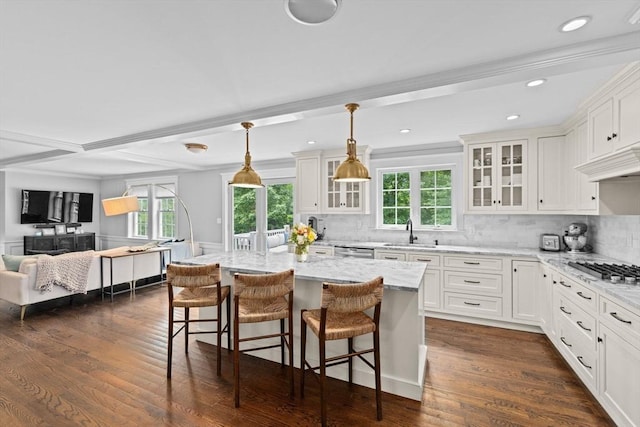 161 Hollett St, Scituate, MA 02066 - kitchen with dark wood-type flooring, a breakfast bar, white cabinets, recessed lighting, and beamed ceiling