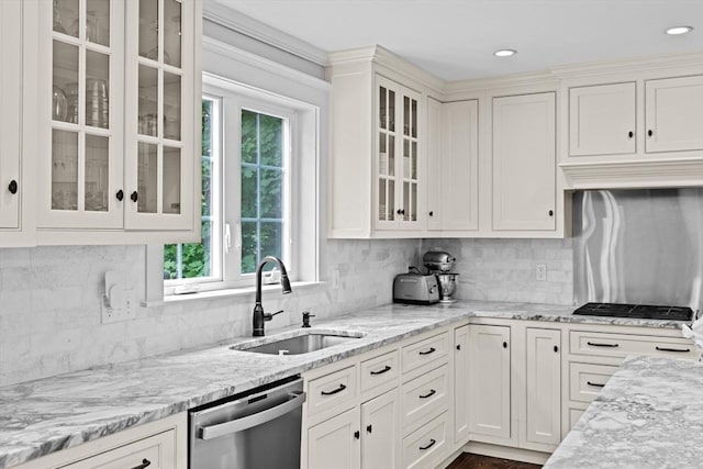 161 Hollett St, Scituate, MA 02066 - kitchen with stainless steel dishwasher, white cabinetry, tasteful backsplash, and recessed lighting