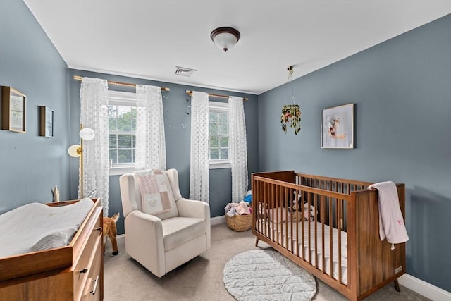 161 Hollett St, Scituate, MA 02066 - carpeted bedroom with baseboards and a nursery area