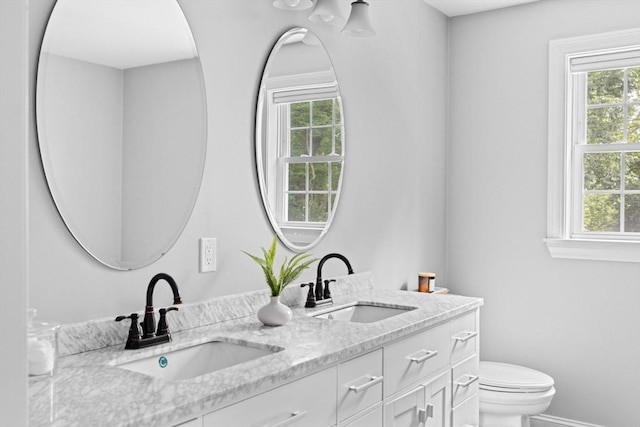 161 Hollett St, Scituate, MA 02066 - bathroom featuring plenty of natural light and double vanity