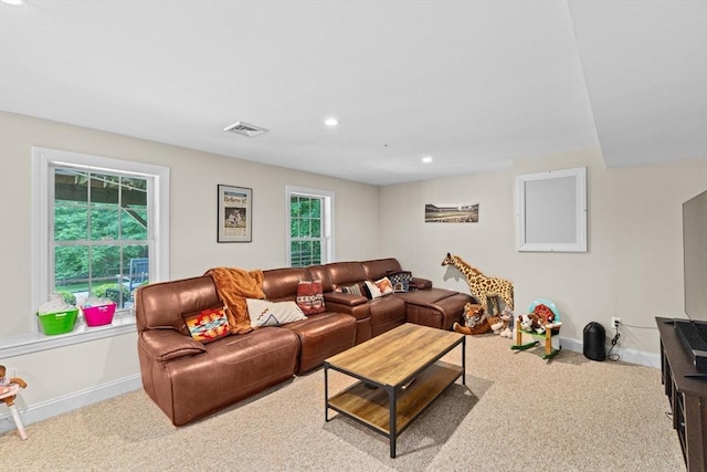 161 Hollett St, Scituate, MA 02066 - carpeted living room with baseboards and recessed lighting