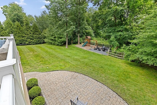 161 Hollett St, Scituate, MA 02066 - view of yard featuring a playground and a patio area