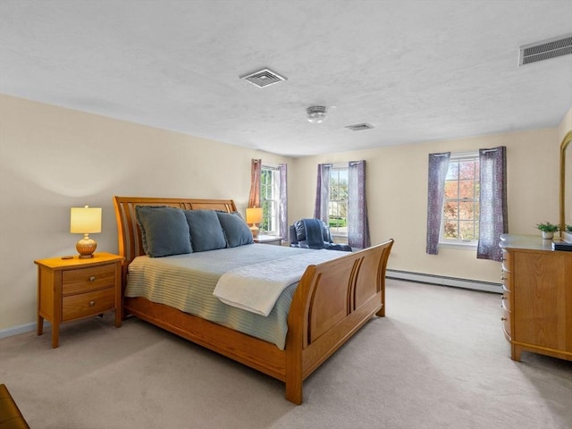8 Kennedy Ln, Acton, MA 01720 - bedroom with baseboard heating, light carpet, multiple windows, baseboards, and a textured ceiling