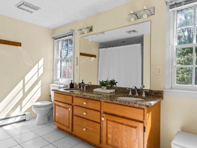 8 Kennedy Ln, Acton, MA 01720 - bathroom with toilet, a baseboard heating unit, double vanity, and tile patterned flooring