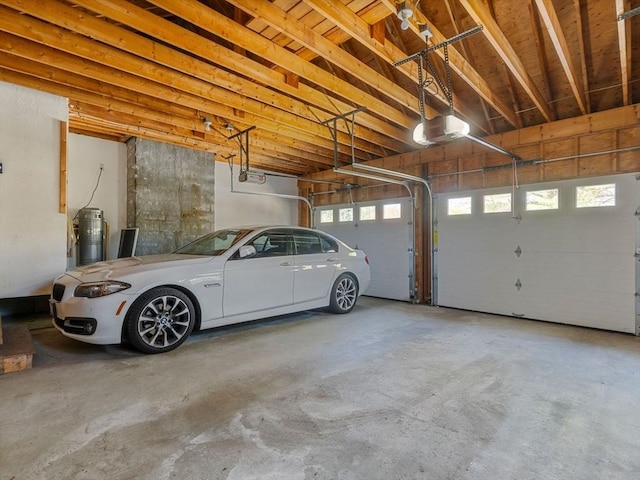 8 Kennedy Ln, Acton, MA 01720 - garage with a garage door opener