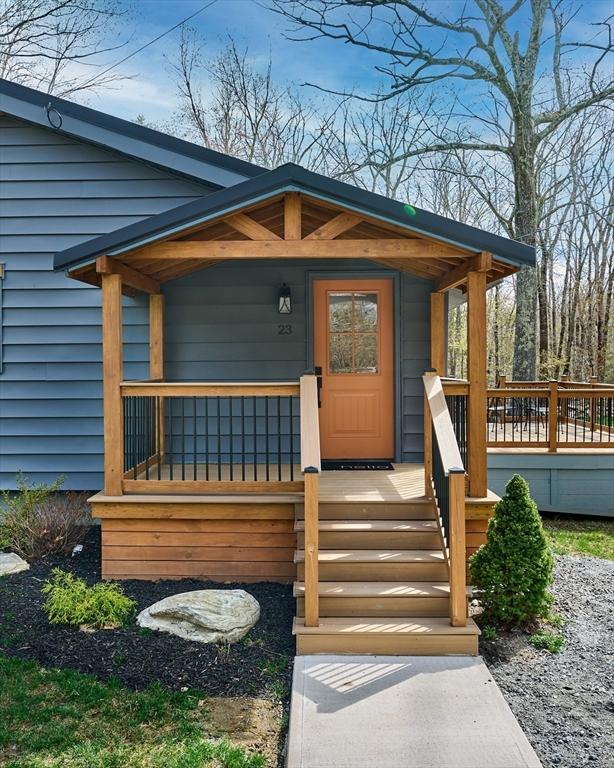 doorway to property with a porch