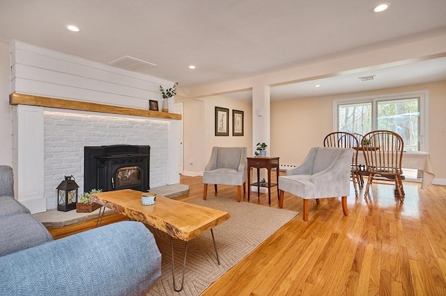 living room featuring light wood-style floors and recessed lighting