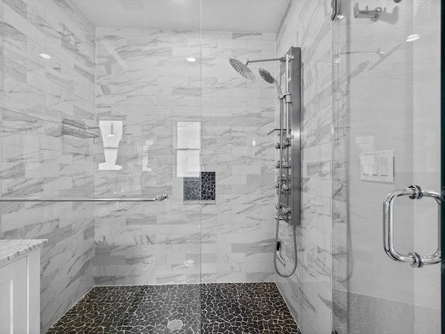 bathroom with a stall shower