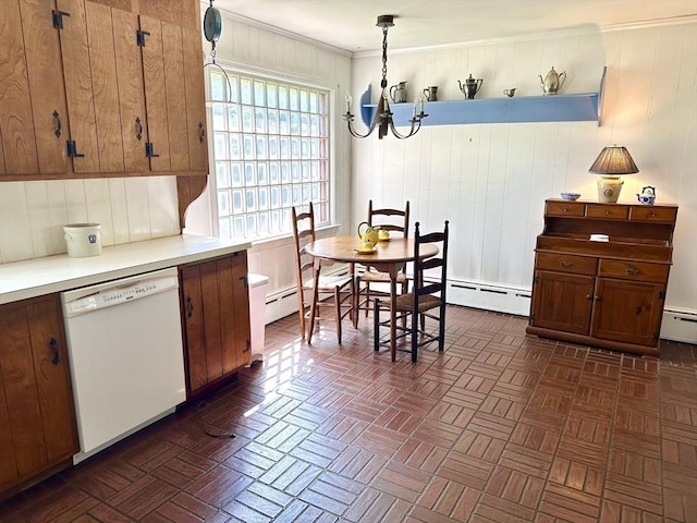 631 Elm St, Dartmouth, MA 02748 - kitchen featuring white dishwasher, a chandelier, light countertops, brown cabinets, and hanging light fixtures